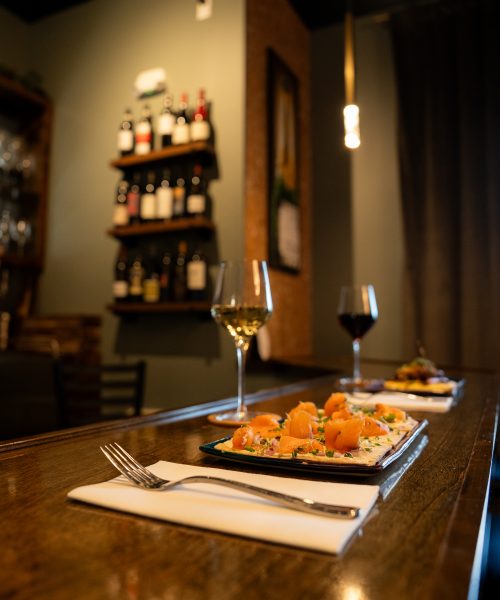 Table with appetizers and wine